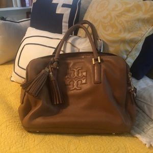 Tory Burch bag.  3 zippered compartments, 2 non-zippered compartments.